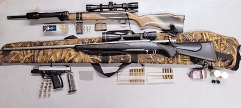 Police: Loaded guns, drugs found in search of truck